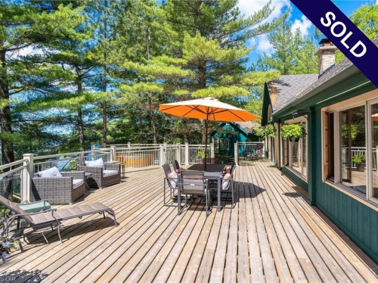 House exterior in Muskoka property listing.